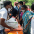 HOPE staff distribute emergency food rations
