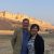 Phil Mumby with his wife, pictured in front of a fort in Jaipur, India