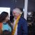 Christopher Biggins laughs with event attendee